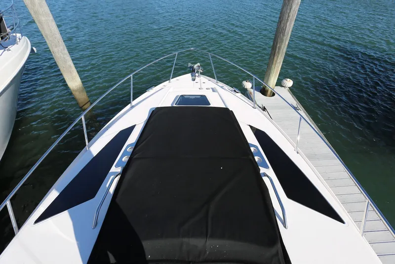 Slide: The Image of 2012 Regal 35 Sport Coupe yacht docked at marina, top view. - 62