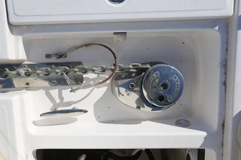 Slide: The Image of Anchor chain mechanism on a 2012 Regal 35 Sport Coupe boat. - 67