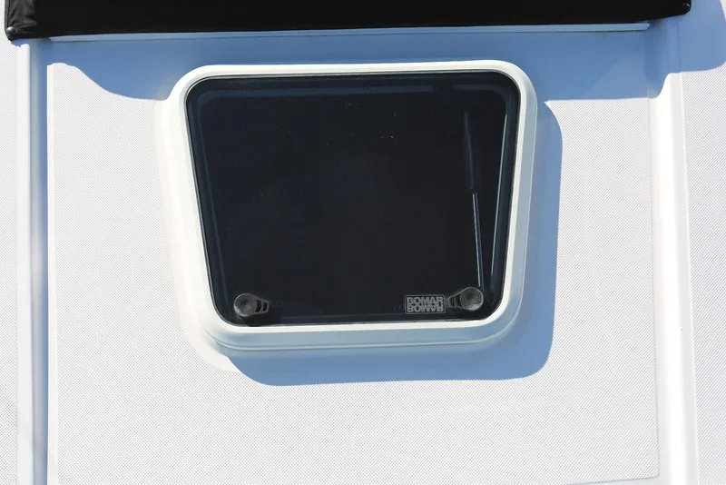 Slide: The Image of 2012 Regal 35 Sport Coupe window detail with Bomar logo. - 69