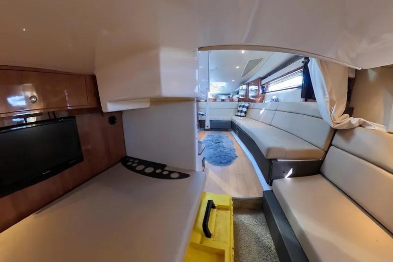 Slide: The Image of Luxurious interior of 2012 Regal 35 Sport Coupe with plush seating and modern amenities. - 75