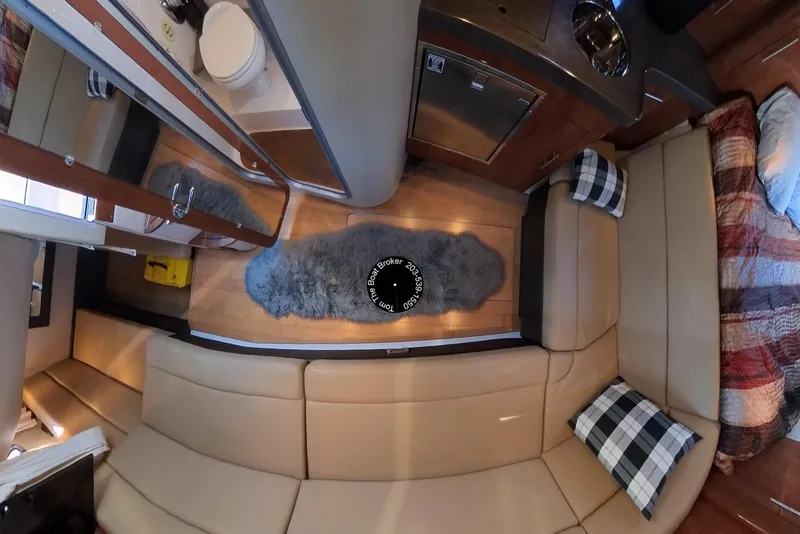 Slide: The Image of Interior of 2012 Regal 35 Sport Coupe with modern furnishings and cozy decor. - 81