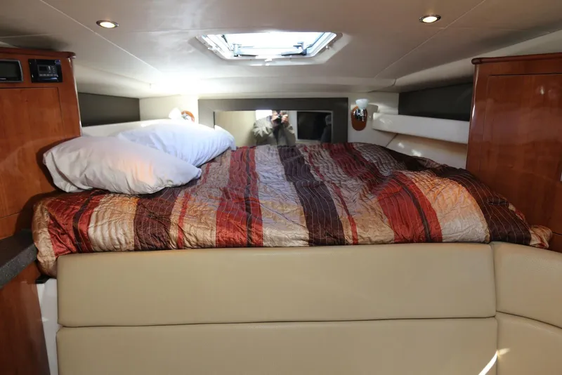 Slide: The Image of Interior cabin of 2012 Regal 35 Sport Coupe with bed and skylight. - 86