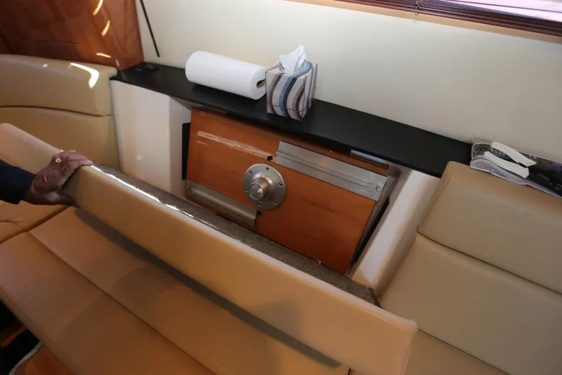 Slide: The Image of Interior of 2012 Regal 35 Sport Coupe with seating and storage area. - 90