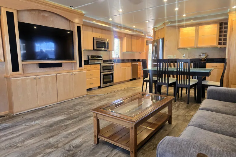 Slide: The Image of Luxurious 2013 Thoroughbred 80'x 18' houseboat interior with modern kitchen and spacious living area. - 25