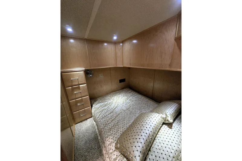 Slide: The Image of Luxurious bedroom interior in 2013 Thoroughbred 80'x 18' model with elegant bedding. - 48