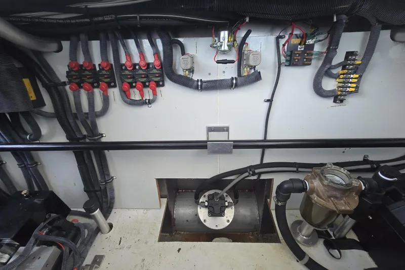 Slide: The Image of Engine room wiring and components of a 2013 Thoroughbred 80'x 18' model. - 56