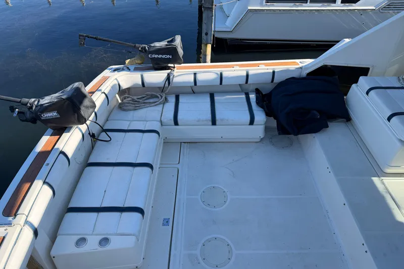 Slide: The Image of 1988 Tiara Yachts 3600 Open cockpit with seating and fishing equipment. - 19