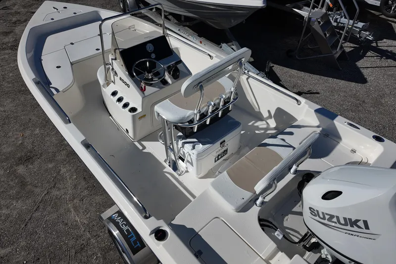Slide: The Image of 2025 Bulls Bay 2000 boat with Suzuki outboard motor, featuring spacious deck and modern controls. - 10