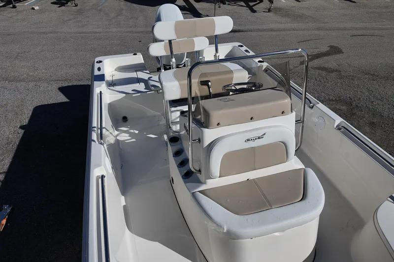 Slide: The Image of 2025 Bulls Bay 2000 boat interior with seating and steering console. - 15