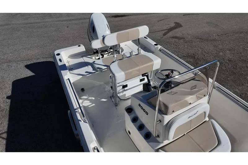 Slide: The Image of 2025 Bulls Bay 2000 boat interior with seating and steering console, viewed from above. - 16