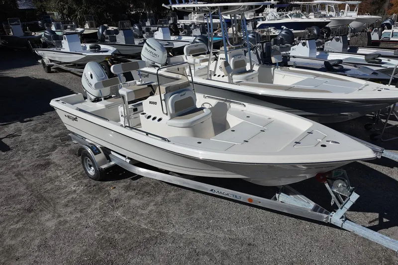 Slide: The Image of 2025 Bulls Bay 2000 boat on trailer, displayed in a marina setting. - 2