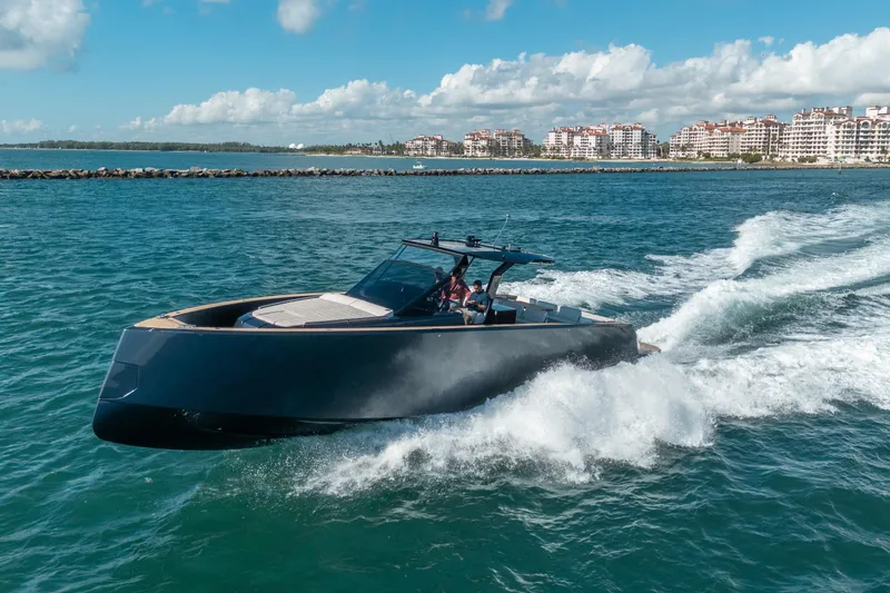 The Image of 2023 Pardo Yachts 43 cruising on blue waters near coastal buildings. - 0