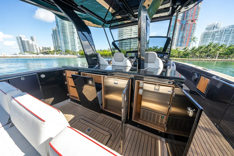 Slide: The Image of Luxurious 2023 Pardo Yachts 43 interior with sleek design and modern amenities, docked by cityscape. - 14