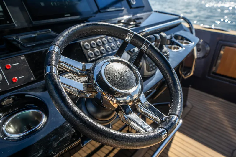 Slide: The Image of Steering wheel of 2023 Pardo Yachts 43, showcasing sleek design and advanced controls. - 19
