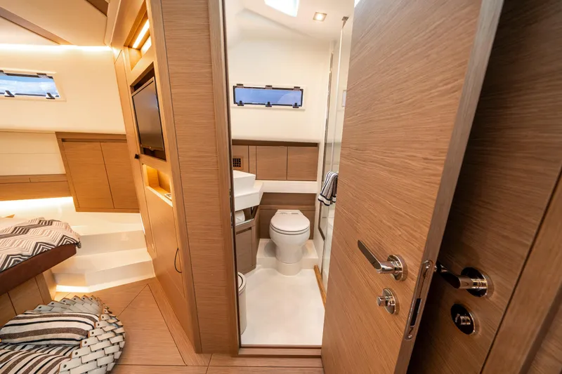 Slide: The Image of Luxurious interior of 2023 Pardo Yachts 43, featuring modern bathroom and cozy cabin space. - 25