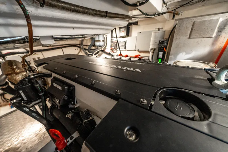 Slide: The Image of Engine room of 2023 Pardo Yachts 43, featuring a Volvo engine. - 39
