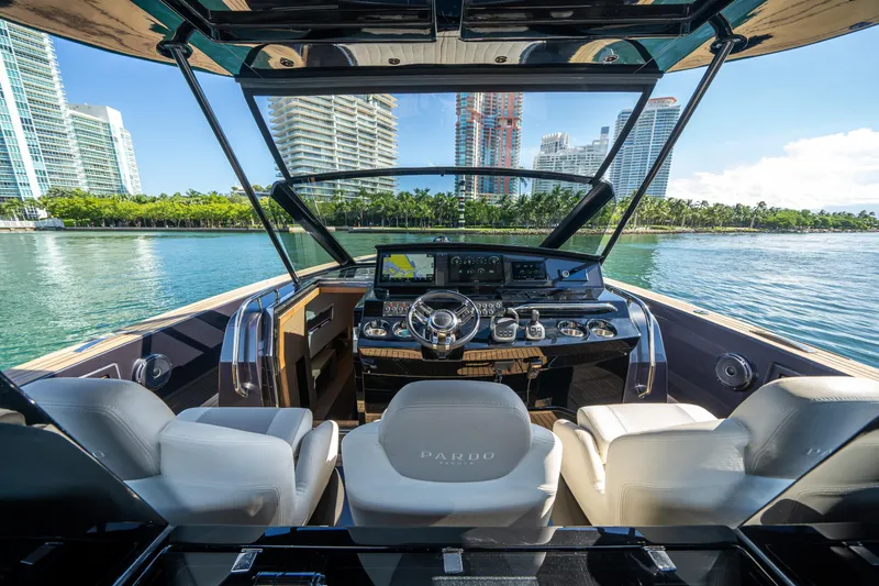 Slide: The Image of Cockpit view of 2023 Pardo Yachts 43, featuring luxurious seating and modern controls. - 4