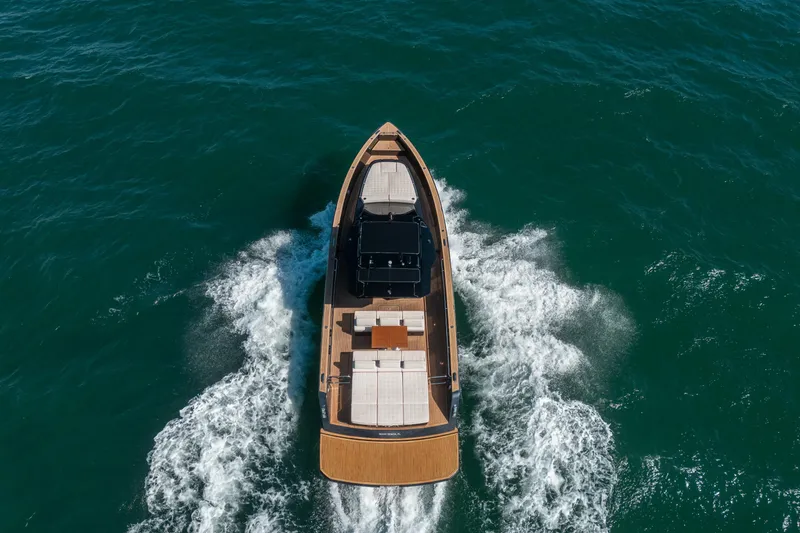 Slide: The Image of 2023 Pardo Yachts 43 cruising on open water, aerial view. - 7