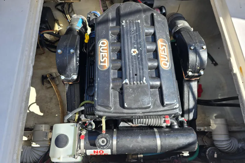 Slide: The Image of Engine compartment of a 1984 Bayliner 2802 Trophy boat with Quest components. - 11
