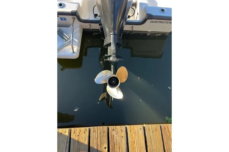 Slide: The Image of Propeller of a 2017 Boston Whaler 190 Montauk boat docked in water. - 5