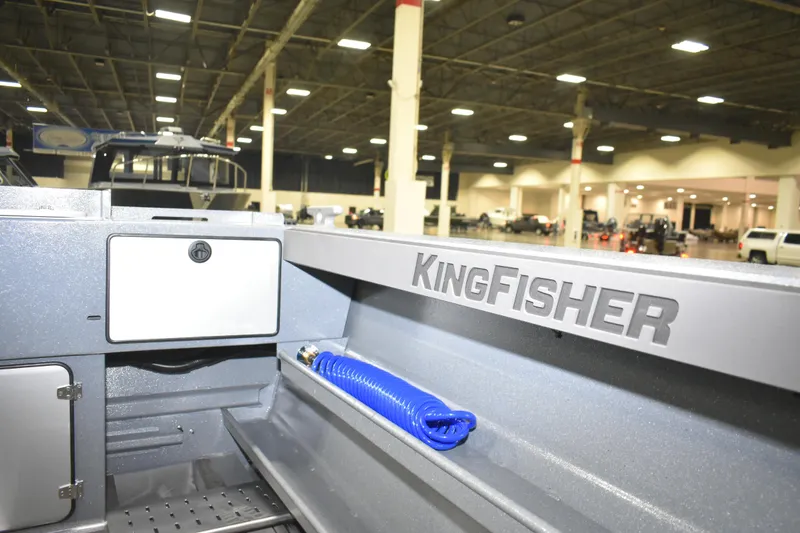 Slide: The Image of 2026 KingFisher 2825 Coastal Express boat interior at an indoor exhibition. - 16