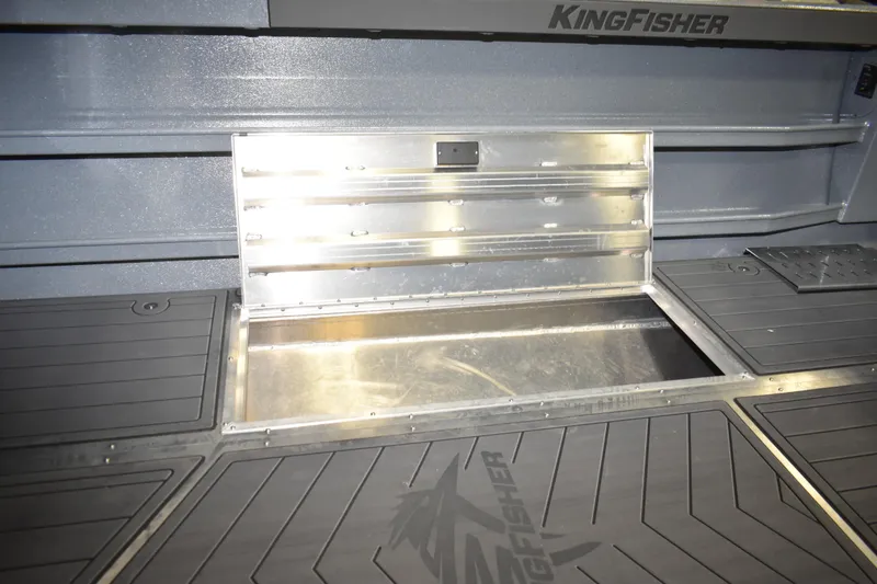 Slide: The Image of 2026 KingFisher 2825 Coastal Express boat storage compartment, open and empty. - 26