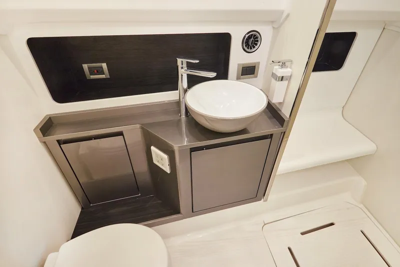 Slide: The Image of Modern bathroom interior of 2026 Schaefer Yachts V44, featuring sleek sink and cabinetry. - 12