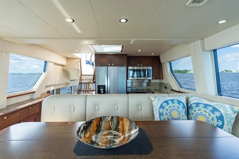 Slide: The Image of Luxurious interior of 2009 Pacific Mariner 65 Motoryacht with modern kitchen and elegant decor. - 30