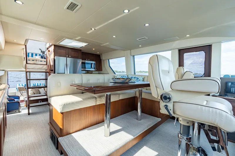 Slide: The Image of Luxurious interior of 2009 Pacific Mariner 65 Motoryacht with elegant seating and modern amenities. - 34