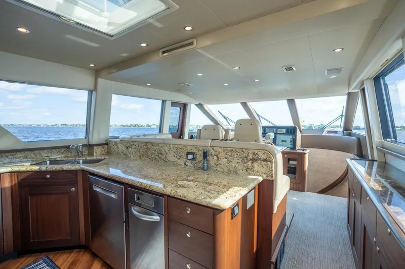 Slide: The Image of Luxurious interior of 2009 Pacific Mariner 65 Motoryacht with granite countertops and panoramic windows. - 37