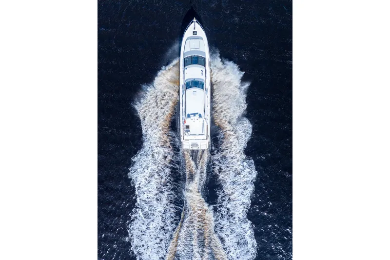 Slide: The Image of Aerial view of 2009 Pacific Mariner 65 Motoryacht cruising on open water. - 4