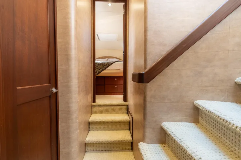 Slide: The Image of Interior hallway of 2009 Pacific Mariner 65 Motoryacht with stairs leading to bedroom. - 42