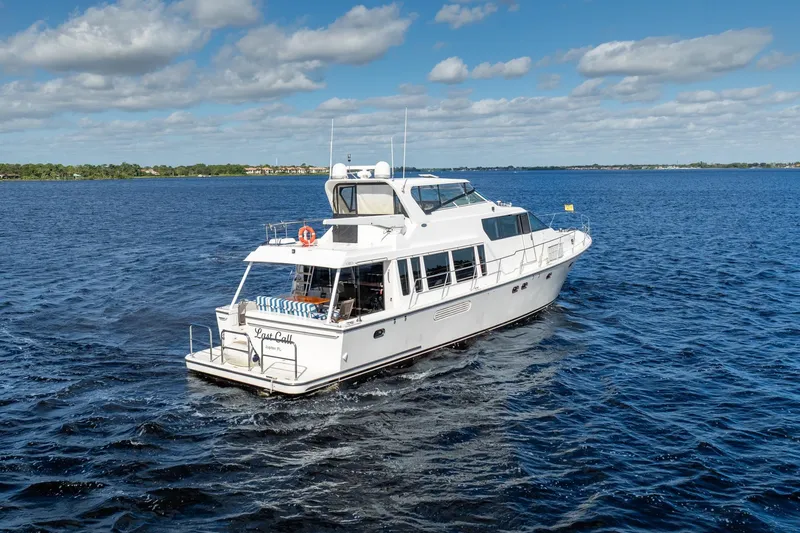 Slide: The Image of 2009 Pacific Mariner 65 Motoryacht cruising on a sunny day with blue skies. - 5