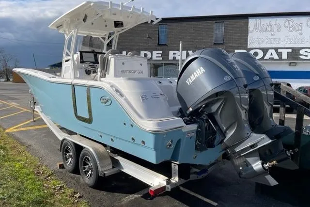 Slide: The Image of 2022 Sea Fox 288 Commander boat on trailer with twin Yamaha engines. - 14