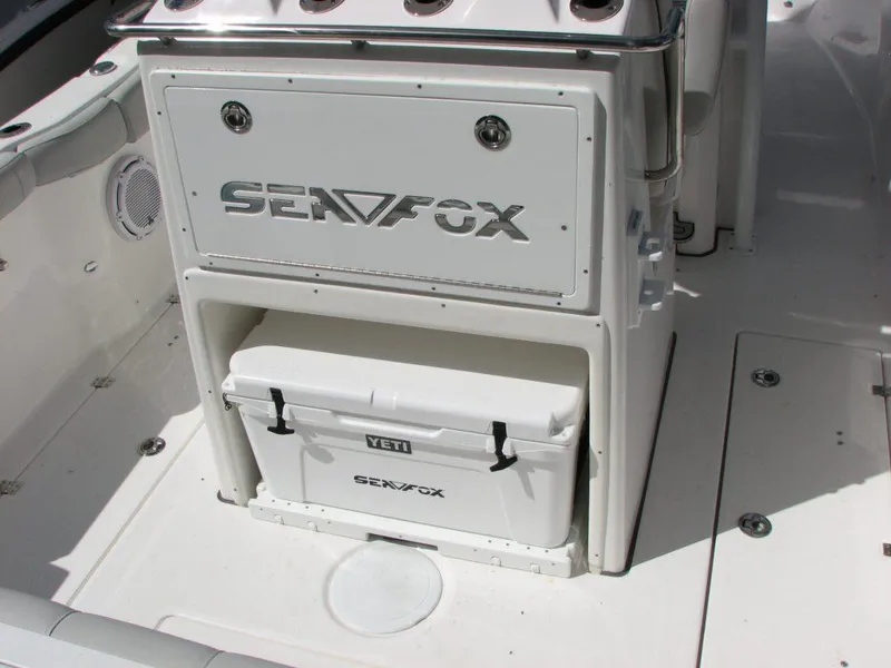 Slide: The Image of 2022 Sea Fox 288 Commander boat interior with Yeti cooler storage. - 4