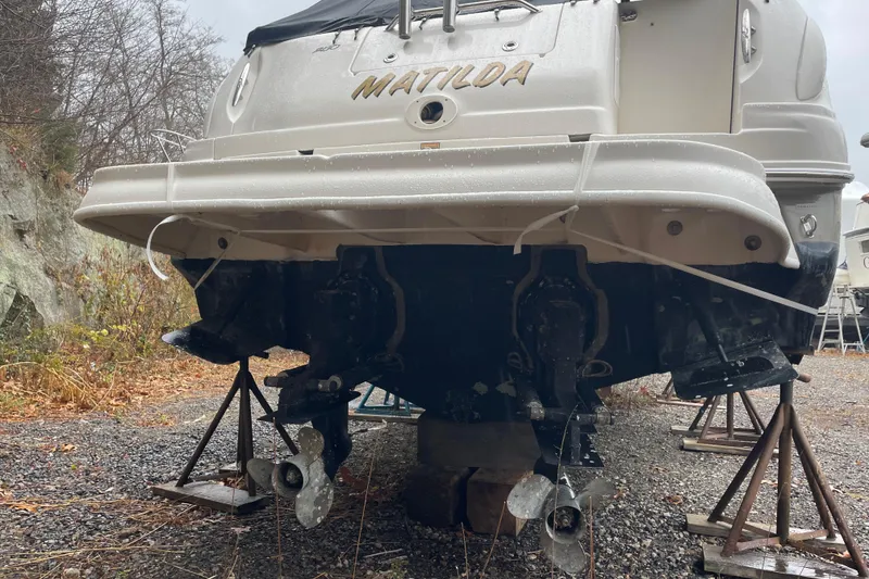 Slide: The Image of 2006 Sea Ray Sundancer 280 boat named Matilda on stands, rear view. - 17