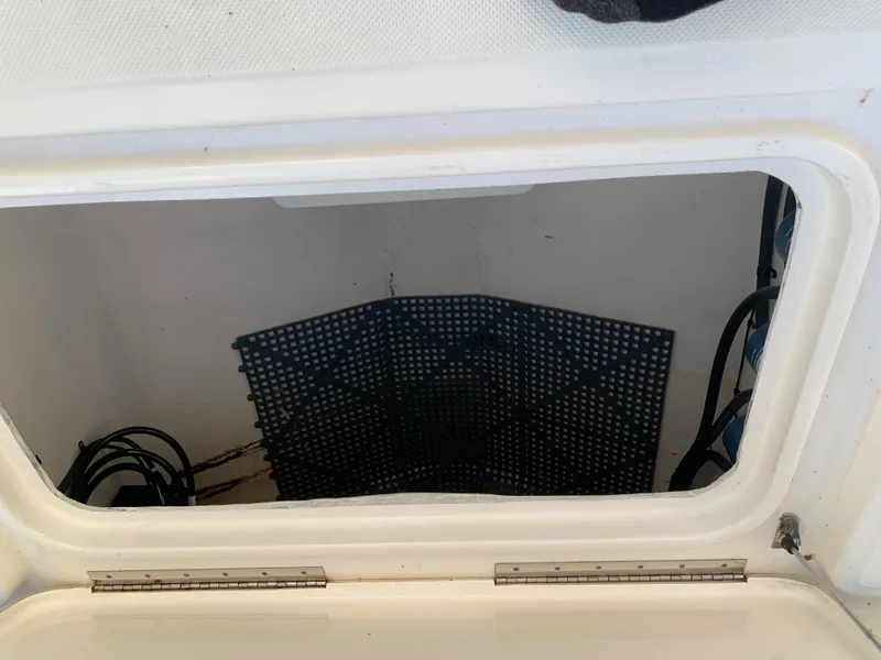 Slide: The Image of Storage compartment of a 2016 Key West 351 Billistic boat. - 13