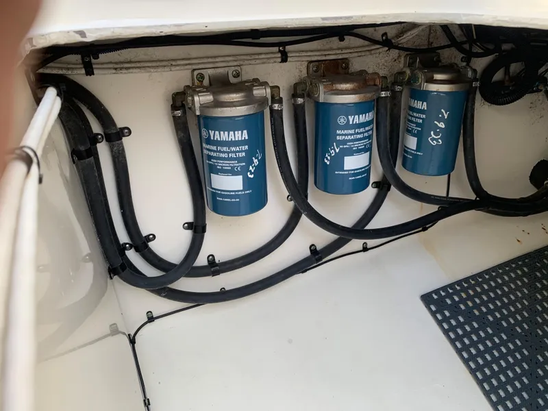 Slide: The Image of Yamaha fuel water separating filters in a 2016 Key West 351 Billistic boat. - 14