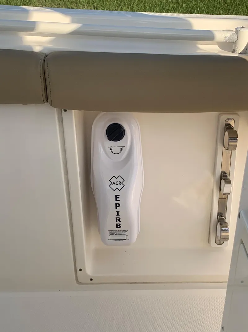 Slide: The Image of 2016 Key West 351 Billistic EPIRB emergency beacon mounted on boat. - 18