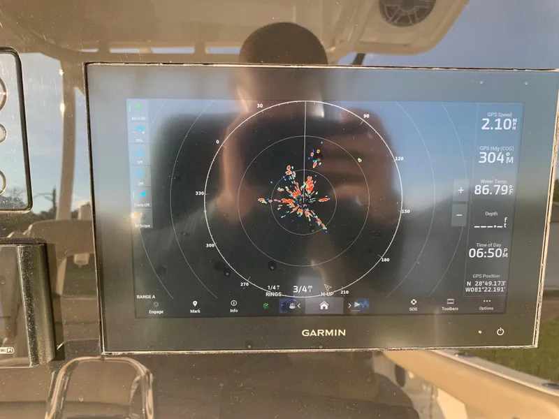 Slide: The Image of Garmin navigation display on 2016 Key West 351 Billistic boat. - 23