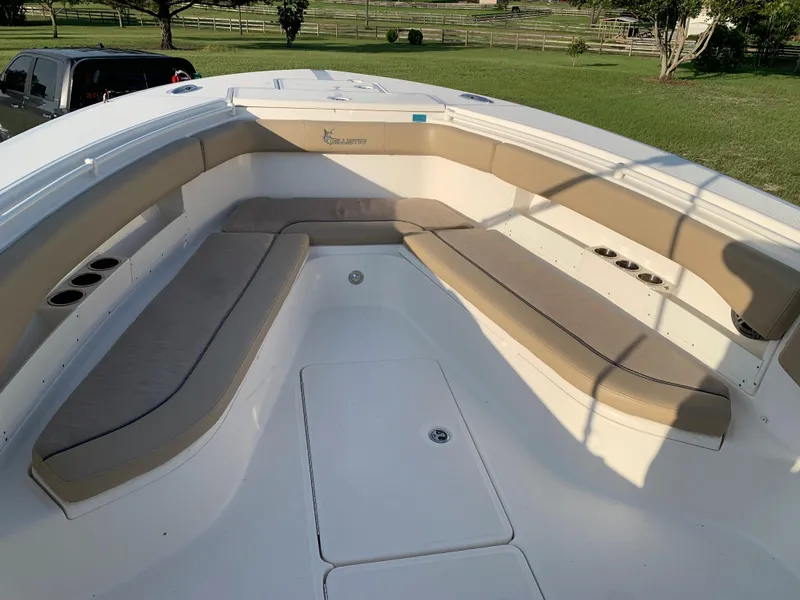 Slide: The Image of 2016 Key West 351 Billistic boat with spacious seating area and cup holders. - 34