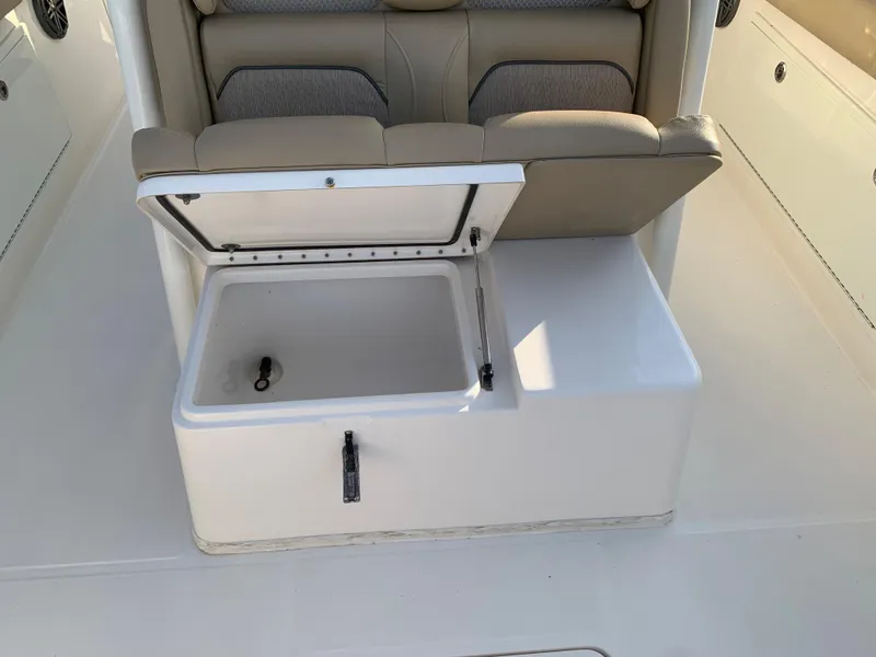 Slide: The Image of 2016 Key West 351 Billistic boat seat with open storage compartment. - 35