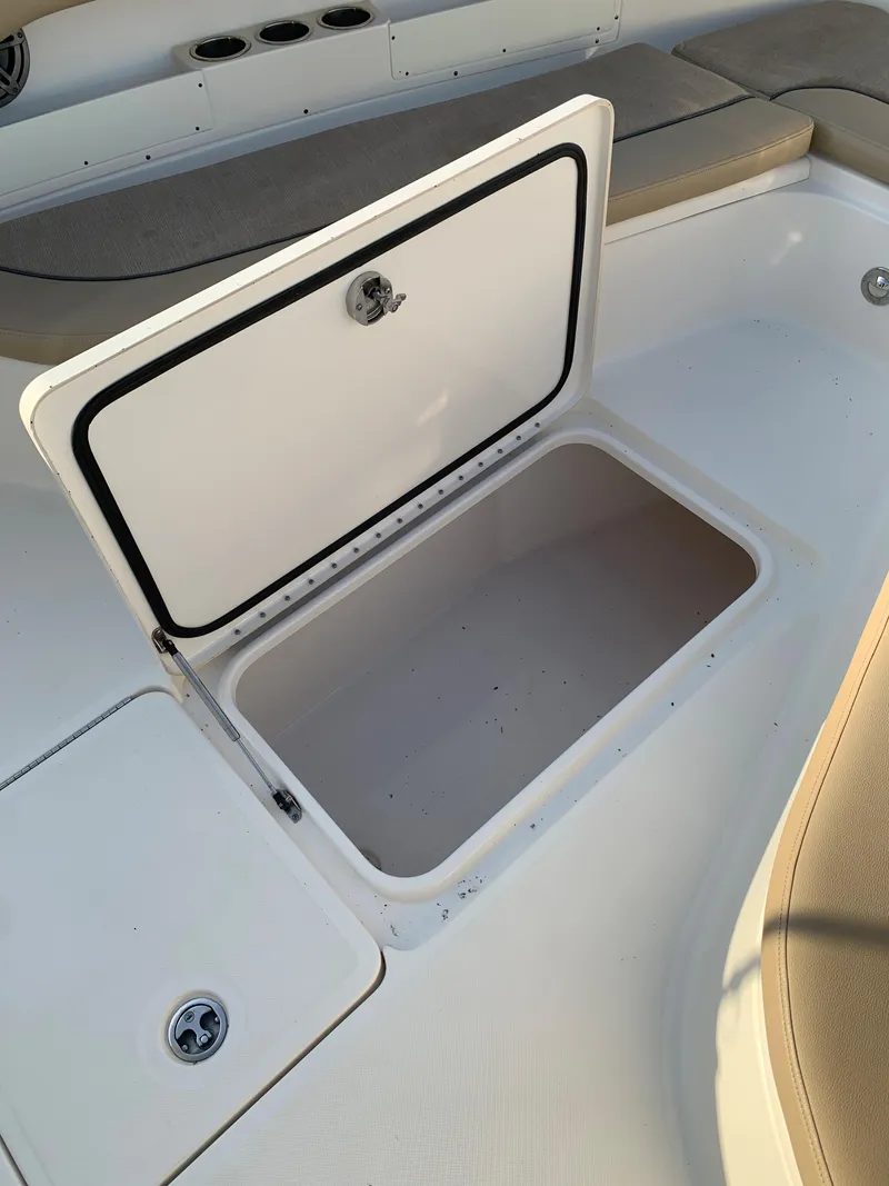 Slide: The Image of 2016 Key West 351 Billistic boat storage compartment open. - 37