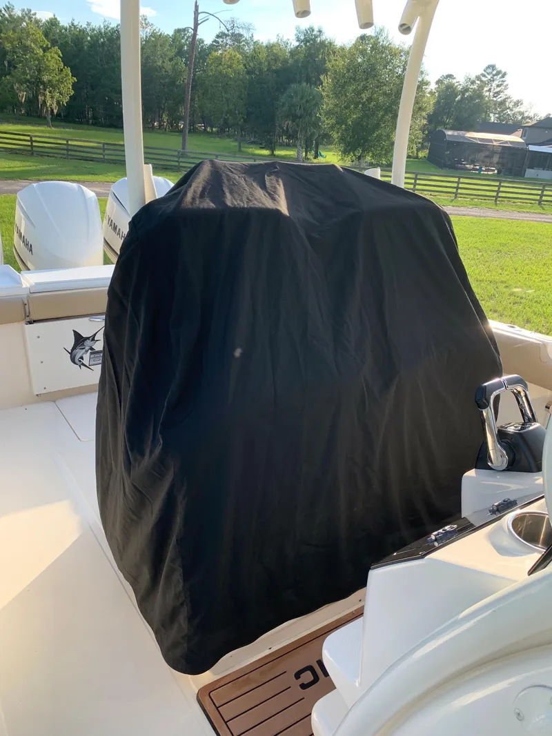 Slide: The Image of 2016 Key West 351 Billistic boat with covered seating area. - 44