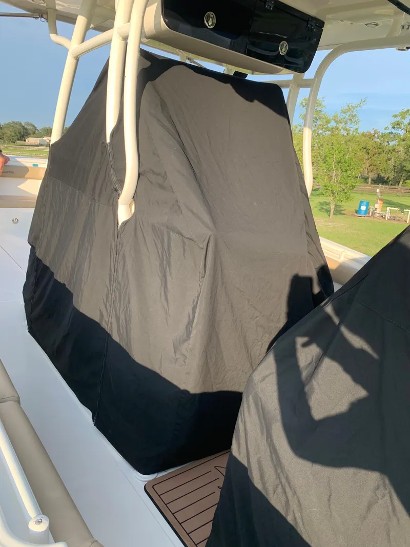 Slide: The Image of 2016 Key West 351 Billistic boat with covered console and seats. - 47