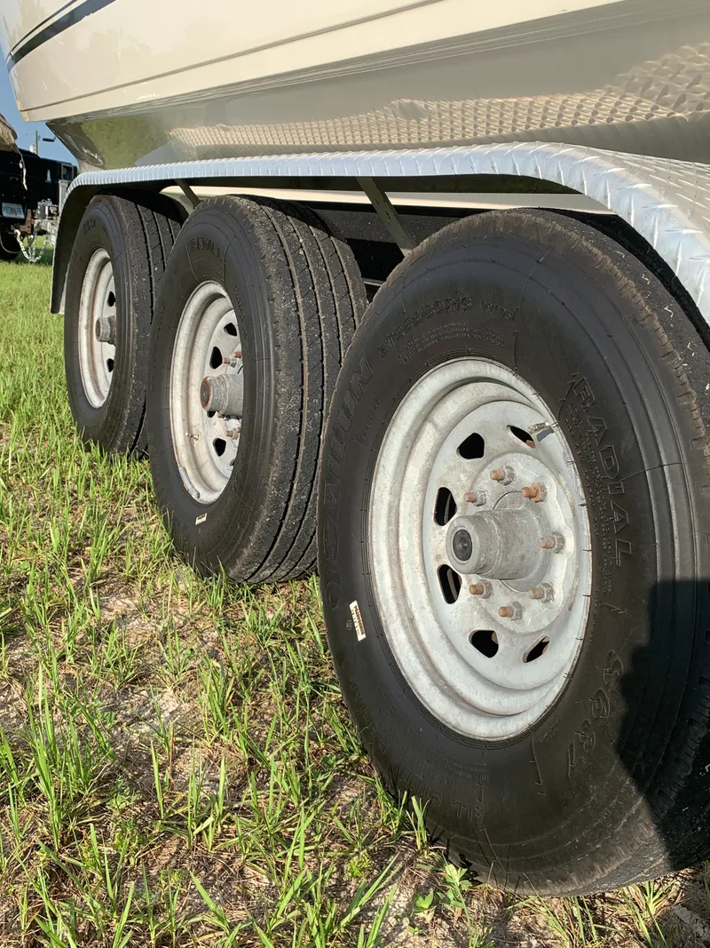 Slide: The Image of 2016 Key West 351 Billistic boat trailer with triple axle wheels. - 5