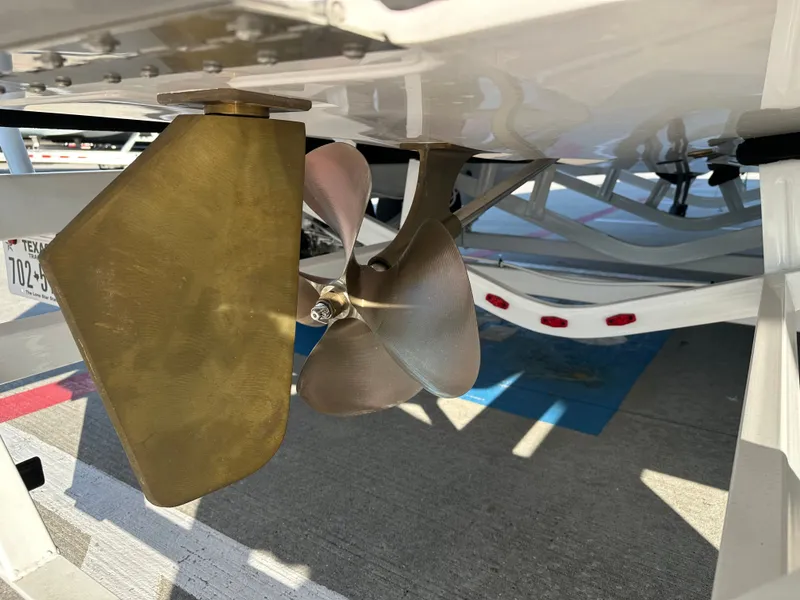 Slide: The Image of 2024 Moomba Max boat propeller and rudder detail, showcasing marine engineering. - 11