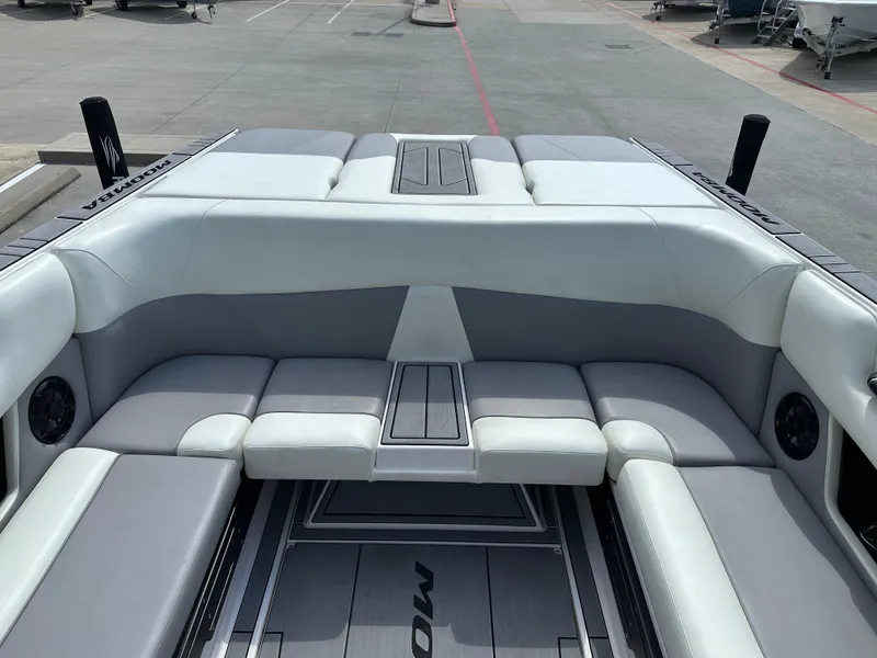 Slide: The Image of 2024 Moomba Max boat interior with spacious seating and modern design. - 19