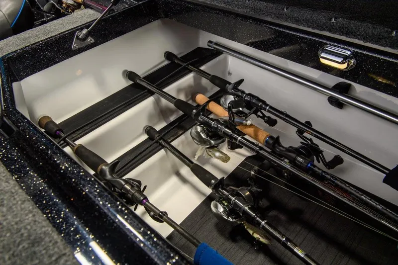 Slide: The Image of Manufacturer Provided Image: Fishing rod storage in 2026 Skeeter ZXE20 boat, showcasing organized compartments. - 12