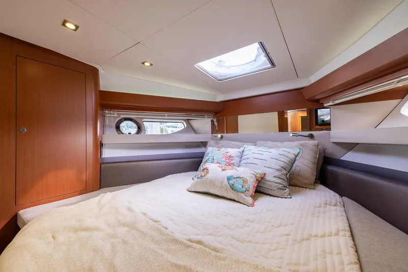 Slide: The Image of Luxurious cabin interior of 2014 Beneteau Gran Turismo 44 yacht with cozy bedding. - 26